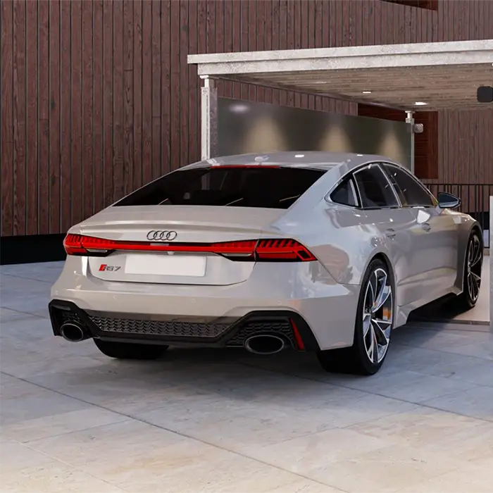 The sports car drives onto the platform of the vehicle lift. This vehicle lift has a canopy and a roof to protect the driver from the bad weather.